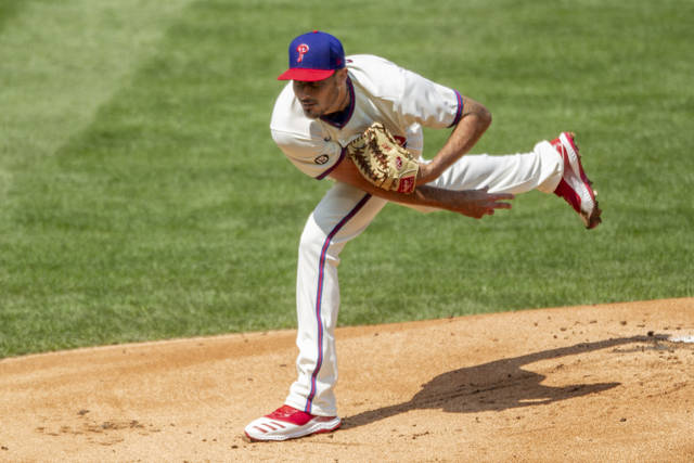 Philadelphia Phillies starting pitcher Zach Eflin throws during the first inning of a game against the Atlanta Braves on Sunday in Philadelphia.
                                 AP photo