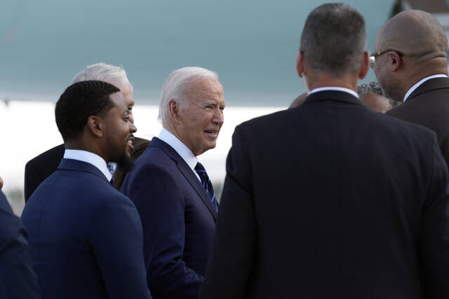 President Joe Biden greets people after arriving at Harry Reid International Airport in Las Vegas, Monday, July 15, 2024.
(AP Photo/Susan Walsh)