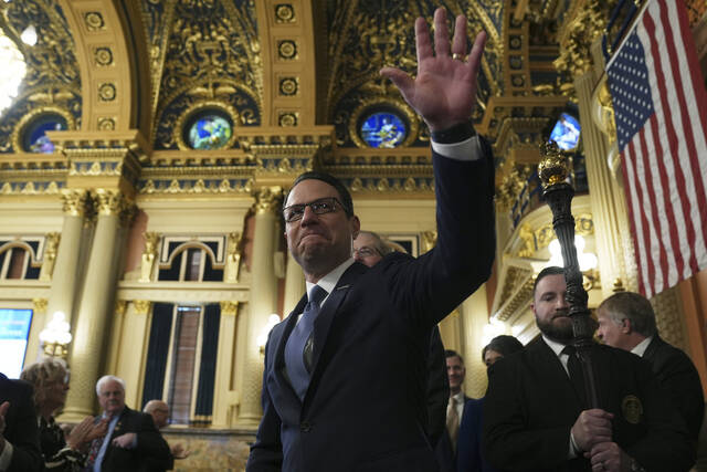 Gov. Josh Shapiro arrives to deliver his budget address for the 2025-26 fiscal year to a joint session of the state House and Senate at the Capitol on Tuesday in Harrisburg.
AP Photo