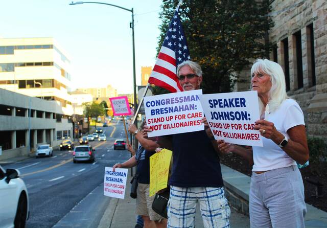 Dozens gather for vigil for thousands who could lose health care coverage